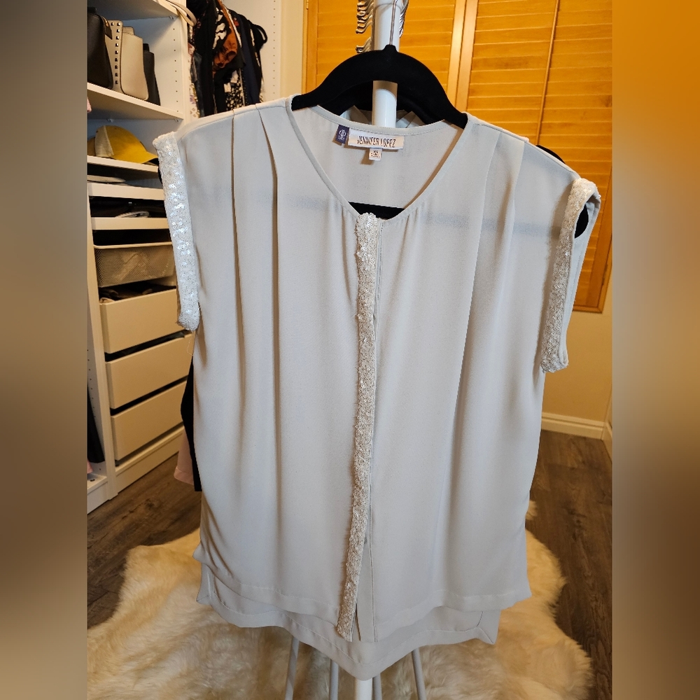 Jennifer Lopez, blush/cream top. Size XS.